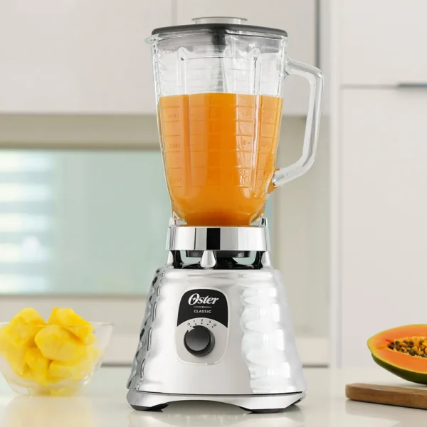 162230-1600-auto LICUADORA OSTER CLASICA CROMADA CON PERILLA VASO VIDRIO 1000W MODELO BLST4655