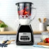 LICUADORA OSTER 2 VELOCIDADES MAS PULSO VASO VIDRIO 800W COLOR NEGRO MODELO BLSTKAGBPB